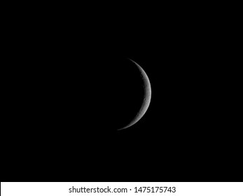 Waxing crescent moon seen with an astronomical telescope