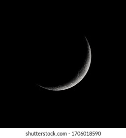 Waxing Crescent moon through amateur telescope