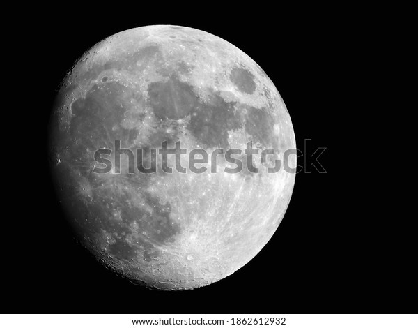 waxing gibbous moon. moon background. moon\
wallpaper. moon surface. black and\
white