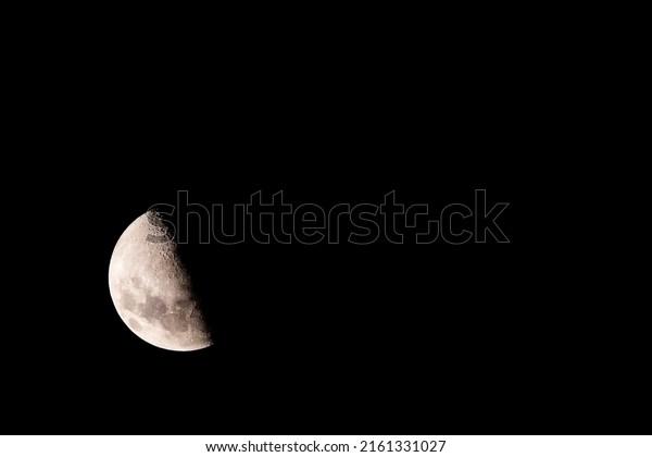 Waxing quarter moon in the\
sky night