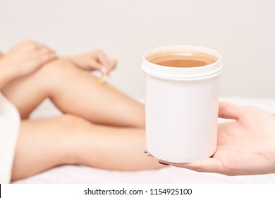 Waxing Woman Leg. Sugar Hair Removal. Laser Service Epilation. Salon Wax Beautician Procedure.