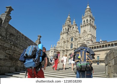 Way of St James , Camino de Santiago ,  pilgrims arrive  to Compostela Cathedral ,Galicia, Spain 