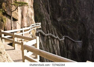 The way up , Stone Steep Steps . Trekking walking hiking Huangshan Mountain. Anhui, China. 13th , April 2009
