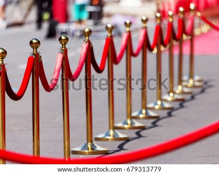 Way to success on the red carpet (Barrier rope). Selective focus
