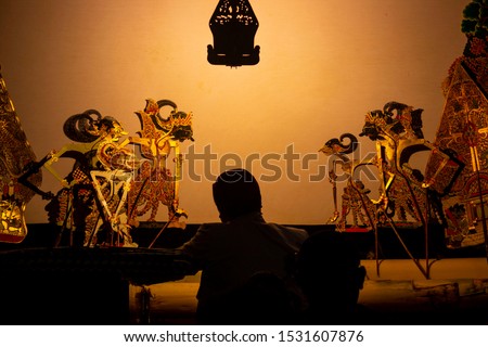 
wayang kulit or shadow puppets from Java, Indonesia
puppet show by dalang or puppeteer . Wayang made from leather