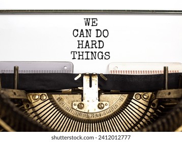 We can do hard things symbol. Concept words We can do hard things typed on beautiful old retro typewriter. Beautiful white background. Business, we can do hard things concept. Copy space.