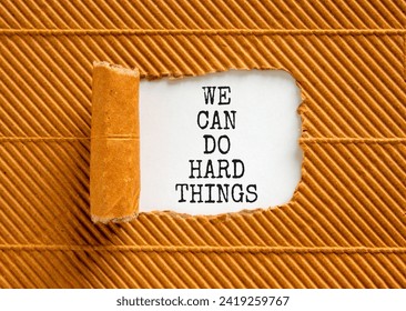 We can do hard things symbol. Concept words We can do hard things on beautiful white paper. Beautiful brown paper background. Business, we can do hard things concept. Copy space.