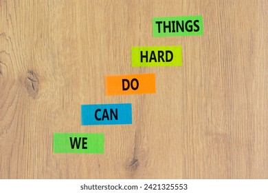 We can do hard things symbol. Concept words We can do hard things on colored paper. Beautiful wooden background. Business, we can do hard things concept. Copy space.