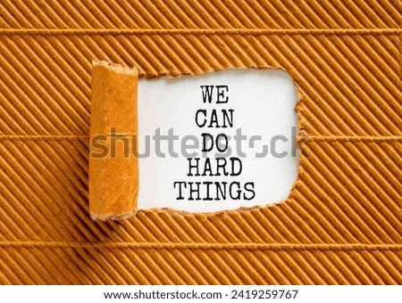 We can do hard things symbol. Concept words We can do hard things on beautiful white paper. Beautiful brown paper background. Business, we can do hard things concept. Copy space.