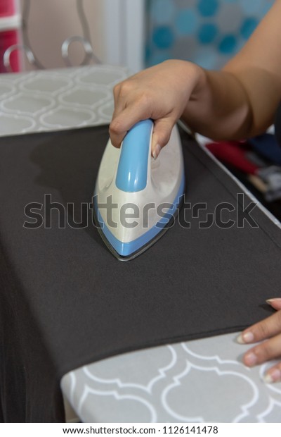 we\
can iron clothes black color in night time or\
holiday