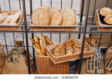 We can see a lot of bread in the storage of the cafe. There are oval and rectangular breads, sticks and a lot of baguettes. - Powered by Shutterstock