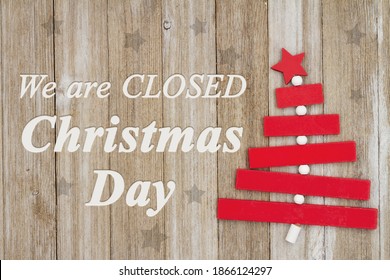 We Are Closed Christmas Day Message With A Wood Christmas Tree On Grunge Wood Sign