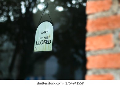 We Are Closed Sign On Glass Door At Shop Or Restuarant 