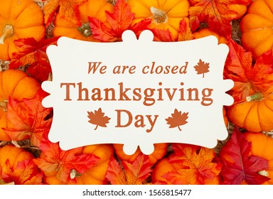 We Are Closed Thanksgiving Day Sign On A Metal Sign On Pumpkins And A Straw Hay