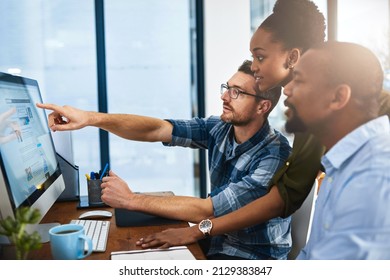 We could add another drop-down bar.... Cropped shot of three businesspeople working around a computer in the office. - Shutterstock ID 2129383847