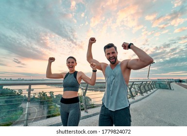 We Did It! Couple Doing Sport Together On The Street.