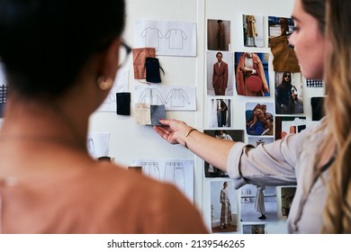 We have to come up with a whole new collection. Cropped shot of two fashion designers discussing ideas. - Powered by Shutterstock