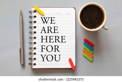 We are here to help, Text message on white paper. - Shutterstock ID 2225981373