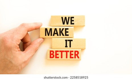 We make it better symbol. Concept words We make it better on wooden blocks. Beautiful white table white background. Businessman hand. Business we make it better concept. Copy space. - Shutterstock ID 2258518925