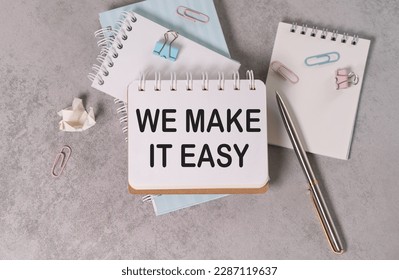 We make it easy text concept isolated over grey background, business concept.