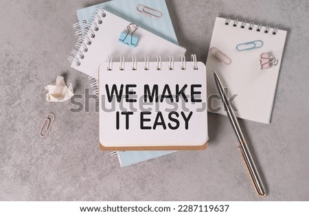 We make it easy text concept isolated over grey background, business concept.