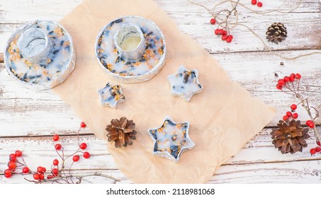 We Make Our Own Bird Food In Foil Molds From Bacon And Seeds. Winter Bird Feeder On A White Wooden Background. View From Above