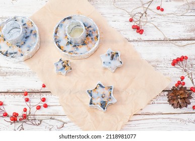 We Make Our Own Bird Food In Foil Molds From Bacon And Seeds. Winter Bird Feeder On A White Wooden Background. View From Above