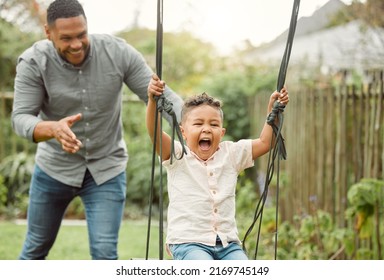 We As Parents Are Their Most Important Role Models. Shot Of A Father And Son Playing Outside.