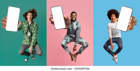 We Recommend This New App. Cool Young Guys With Empty Smartphones Jumping Up In Air Over Colorful Studio Backgrounds, Mobile Application Mockup, Website Template. Panorama