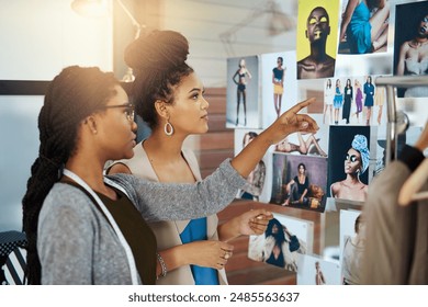 We should go with something similar to that. Shot of two young designers collaborating on a new design. - Powered by Shutterstock