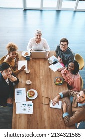 We Stay Ahead By Staying Prepared. Shot Of A Group Of Young Businesspeople Having A Meeting In A Modern Office.