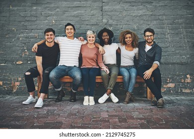 We There For Each Other. Shot Of A Diverse Group Of People Chilling Together Outside.