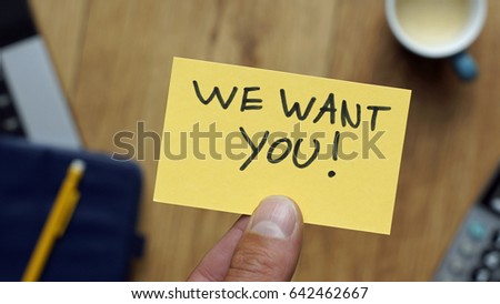 We want you written on a card with hand at a workingplace in a business situation                       