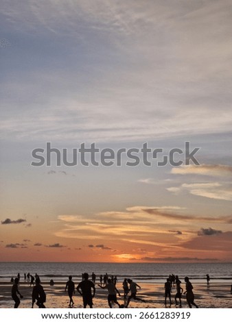 we wathed the sunset while walking along the beach