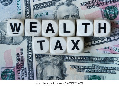 Wealth tax signage with a background of American dollars.