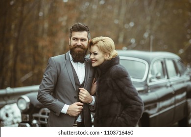 Wealthy Couple At A Classic Retro Car