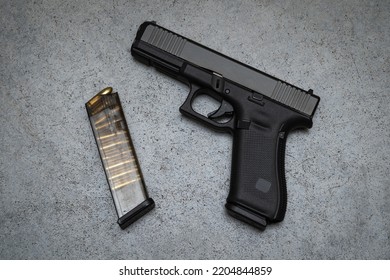 Weapons, 9mm Pistol And Ammo Magazine.