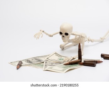 Weapons, Money And Human Skeleton On The White Background