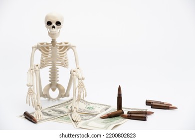 Weapons, Money And Human Skeleton On The White Background