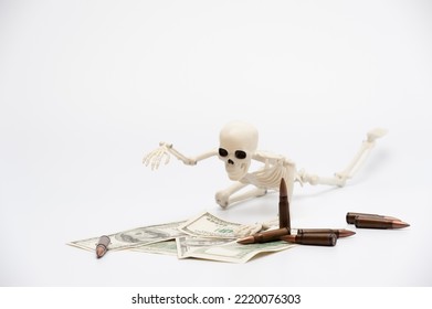 Weapons, Money And Human Skeleton On The White Background