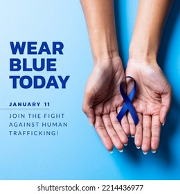 Wear Blue Today, Join The Fight Against Human Trafficking Text And Caucasian Hands With Blue Ribbon. Digital Composite, Copy Space, January 11, Crime, Freedom, Awareness And Prevention Concept.