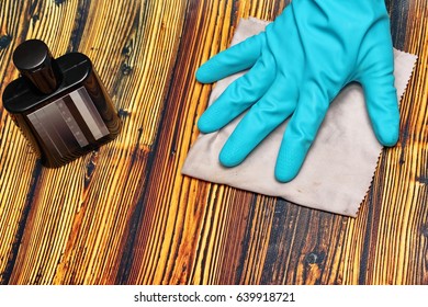 Wear Rubber Gloves And Rubbed Clean Wood Products By Chemical Polishing With A Microfiber Cloth.