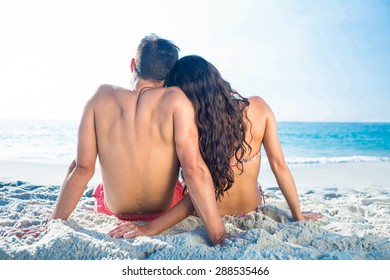 Wear View Of Couple Hugging At The Beach