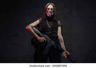 Weared With Mask Female Mercenary Holding Rifle