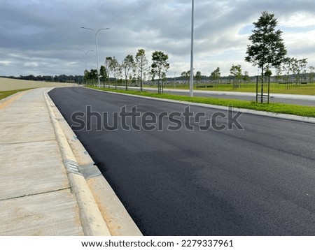 Wearing course as final layer of flexible pavement. The upper layer consists of asphalt concrete, that is a construction aggregate with a bituminous binder.