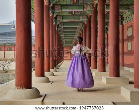 Wearing Hanbok (traditional Korean clothes) in Gyeongbokgung Palace in Seoul, Korea