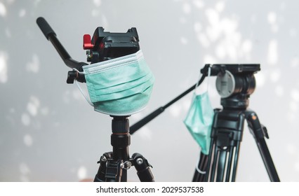 Wearing A Medical Mask To A Tripod, The Cinema Industry In The Covid-19 Pandemic. Film Crew Hygiene Concept