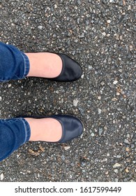 Wearing A Pair Of Mismatched Shoes To Work.