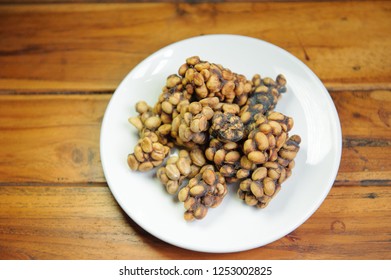 Weasel Coffee Beans On Dish