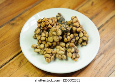 Weasel Coffee Beans On Dish